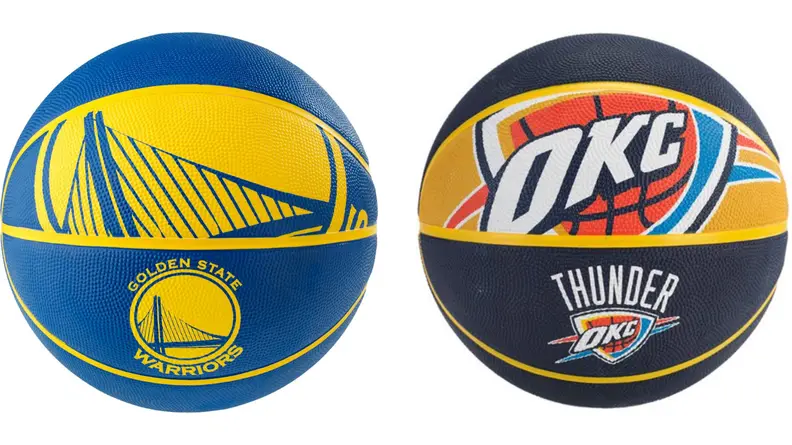 Golden State Warriors basketball next to an OKC basketball