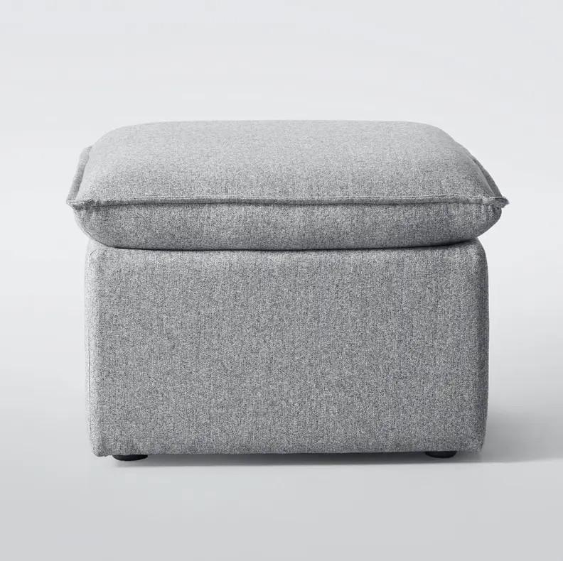 A gray storage ottoman