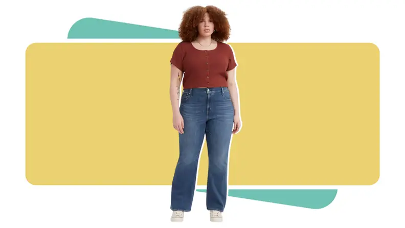 A woman wearing Levi's flare jeans.