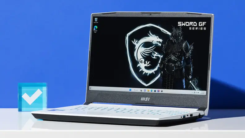 A set-designed photo of the MSI Sword 15 next to a Reviewed blue checkmark.