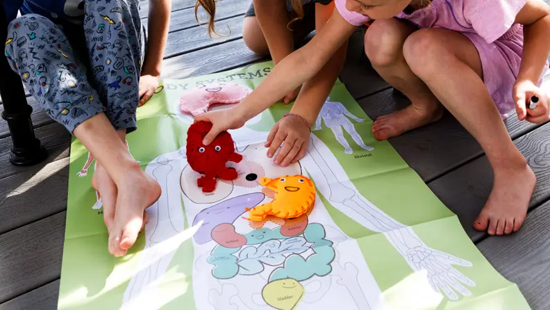 Kids playing with toys from a KiwiCo Box
