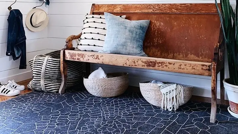 The abstract pattern mimics an African mountain range.
