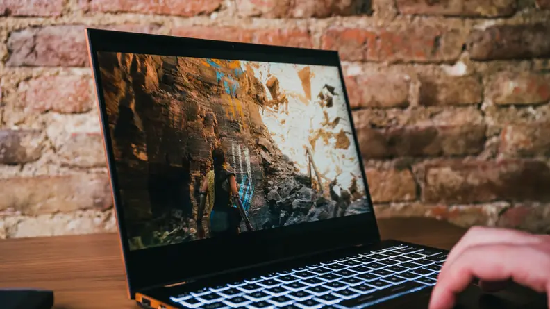 Person watches video on laptop