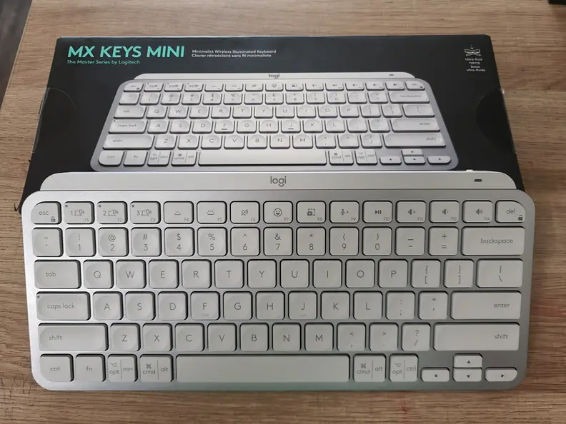 A keyboard propped against a box.