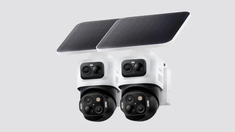 A security camera placed on a gray background