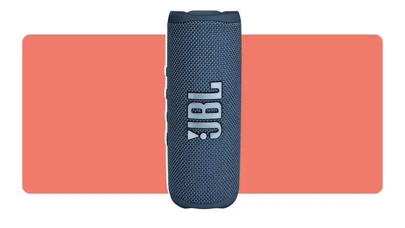 A navy blue JBL Flip 6 Bluetooth Speaker standing vertically with the JBL logo on front.