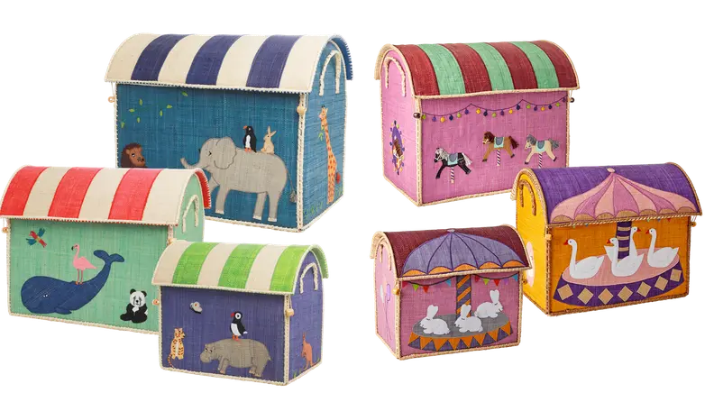 A set of six colorful toy boxes covered in stripes and animals.