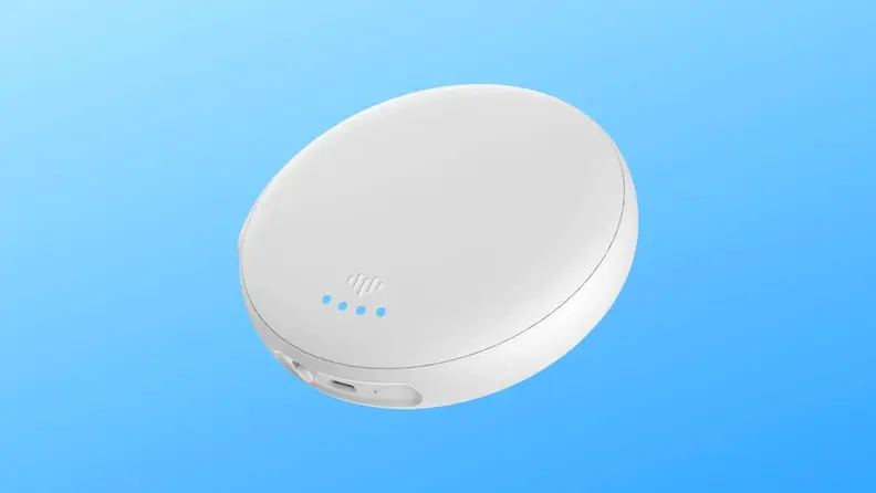 White circular alarm device.