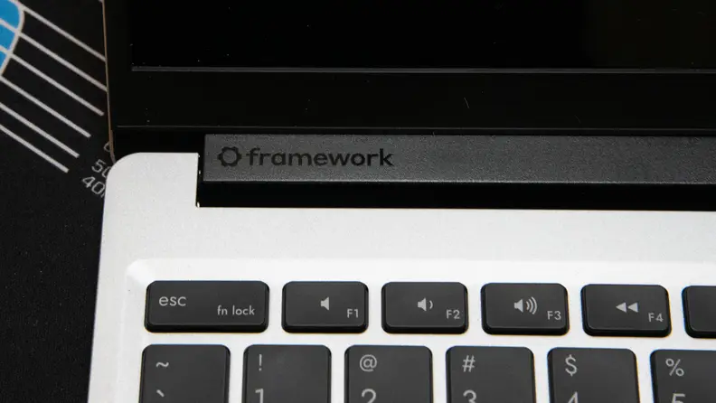 A closeup of the company logo on the hinge.