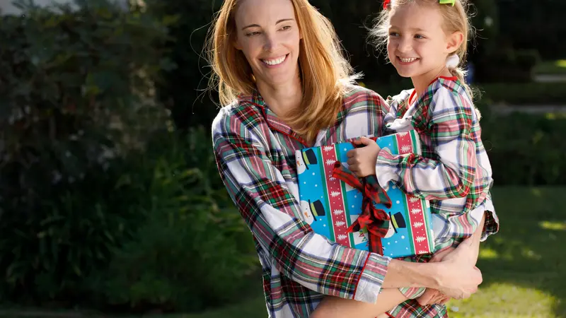 Mom and daughter with a gift