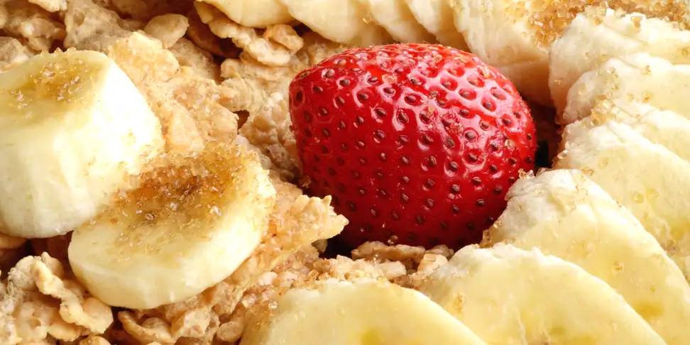 Strawberries and banana on cereal