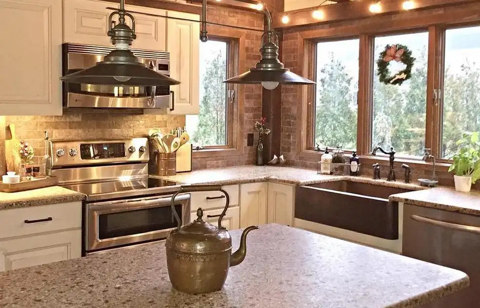 Kitchen with stainless appliances and copper sink
