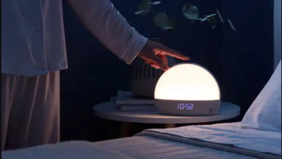The Hatch light illuminated on a nightstand.