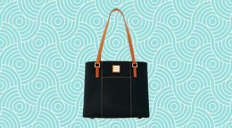 A leather Dooney & Bourke bag on a vibrant teal background.