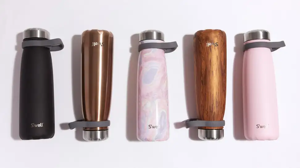 Water bottles on a pink background