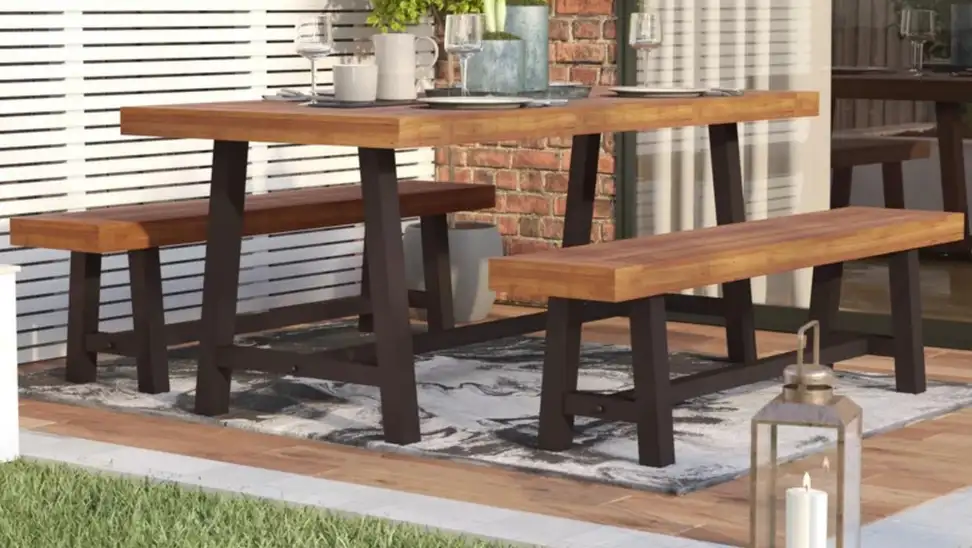 Stylish and modern outdoor patio furniture set next to home.