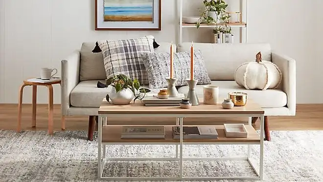A clean and white minimalist living room.