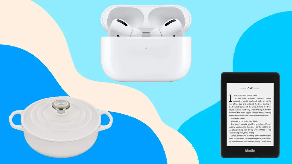 White dutch oven, wireless earbuds, and e-reader tablet in front of blue background.