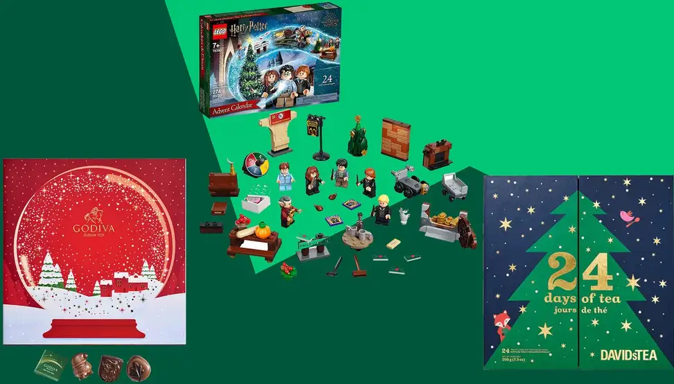 Assorted advent calendars in front of green background.