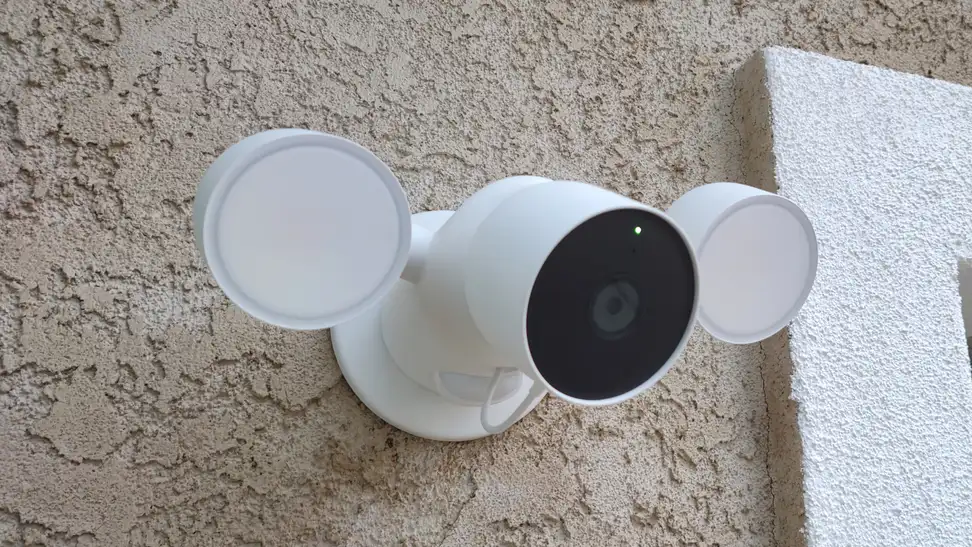 A smarthome security camera mounted on a wall