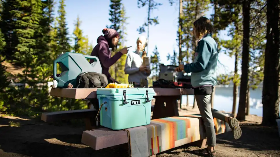 people camping with yeti cooler