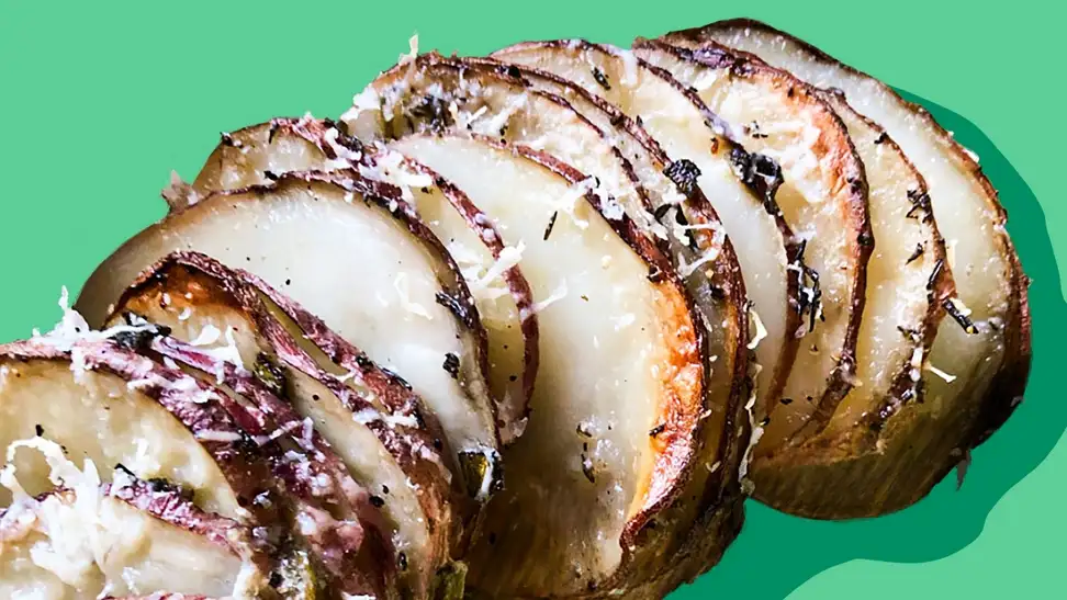 Thinly sliced potatoes covered in melted cheese.