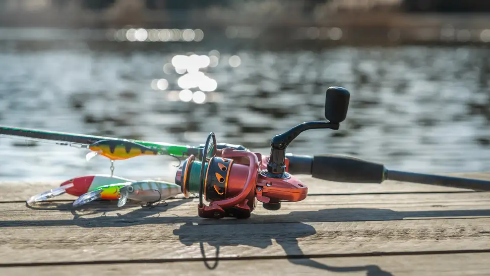 Fishing rod lying on a dock.