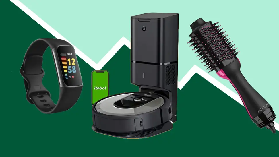 A fitness tracker, robot vacuum, and hair brush on a green background