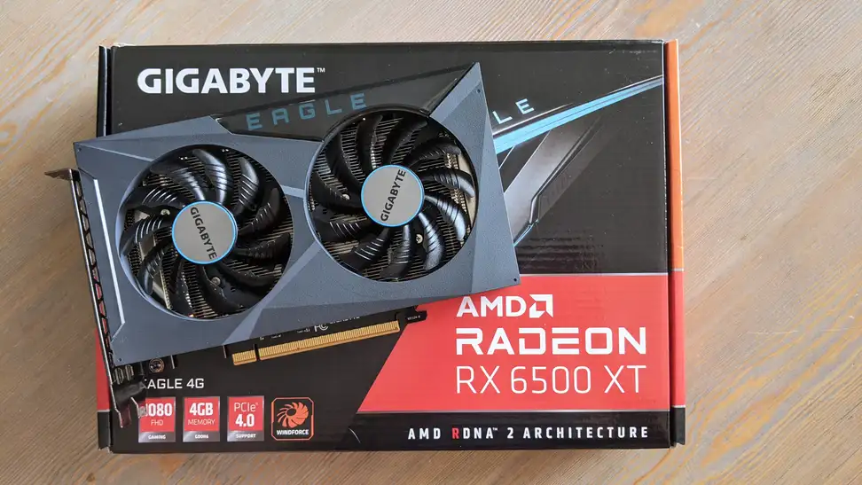 A desktop graphics card sitting on top of its box