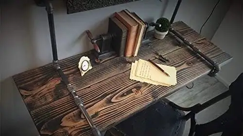 An industrial desk installed in a studio apartment.