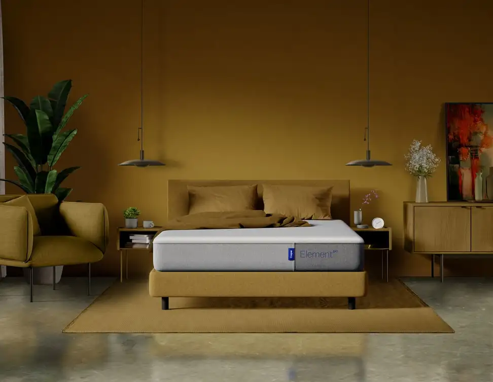 The Casper Element Pro mattress set up in a fully decorated bedroom.