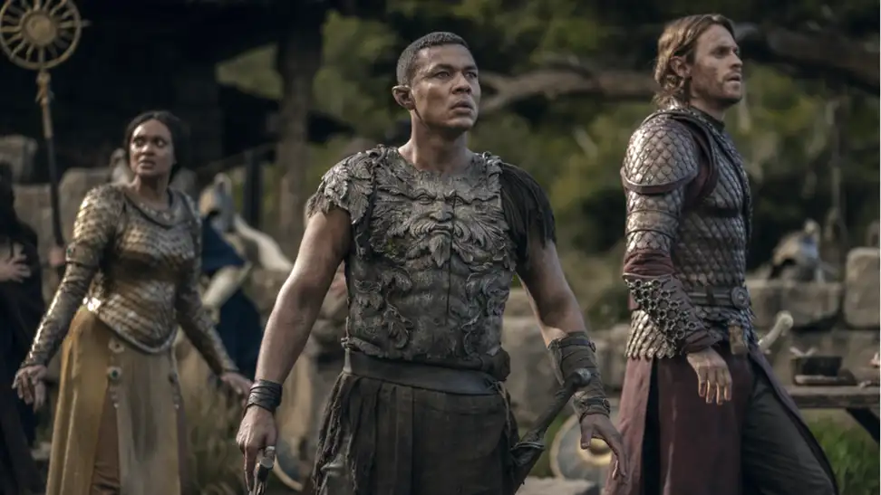 An image from 'The Rings of Power' featuring Míriel, Arondir, and Halbrand.