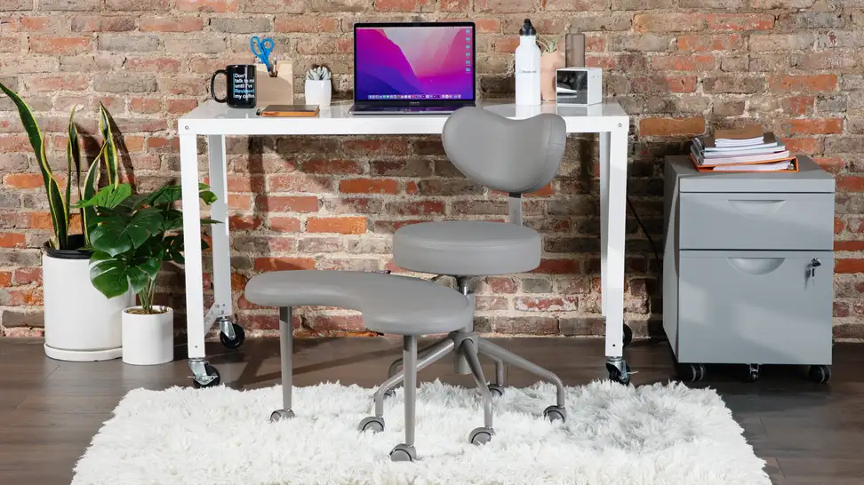 Product shot of the Pipersong Meditation Chair indoors next to desk indoors.