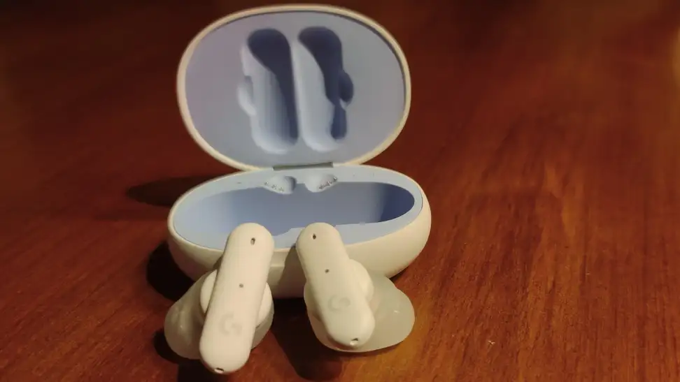 Close-up of the Logitech G Fits earbuds outside of their case.