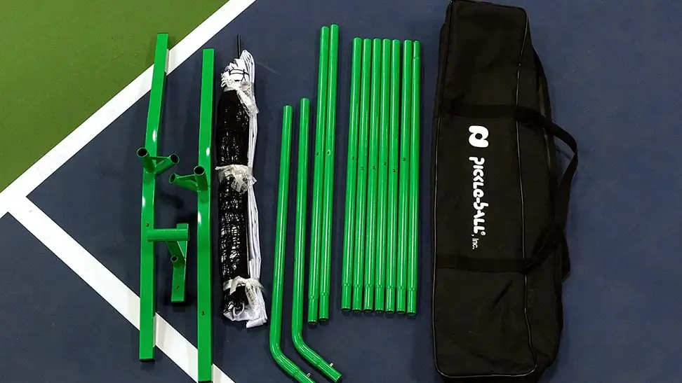 A set of pickleball equipment on a court.