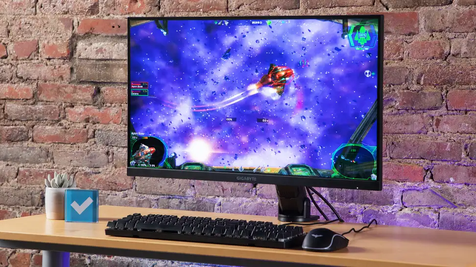 The Gigabyte M28U featuring a picture of a space craft/video game.