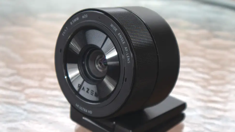 A close up of a large, round black webcam