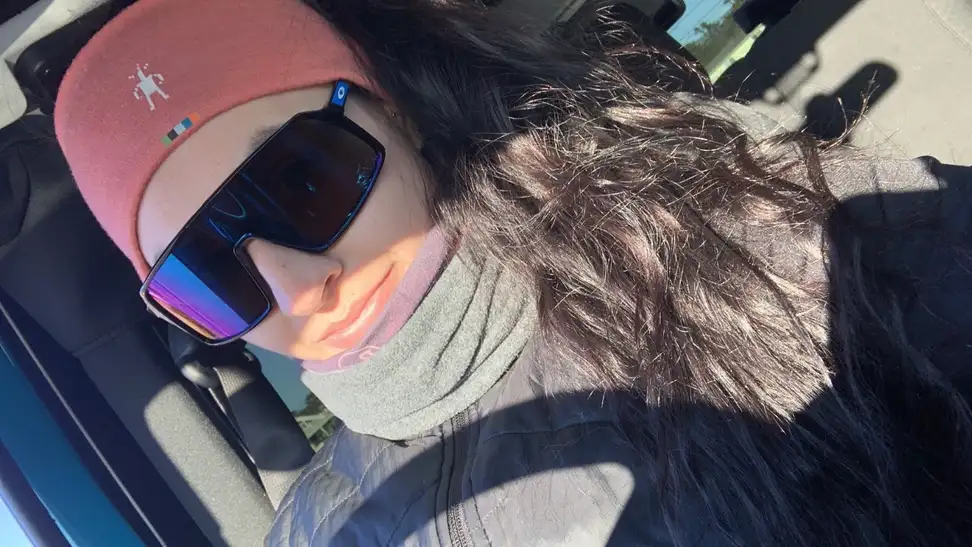 Staff Writer Lily Hartman wearing her Oakley Sutro's in her vehicle.