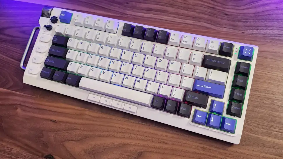 The Nuphy Field75 keyboard on a wood table.