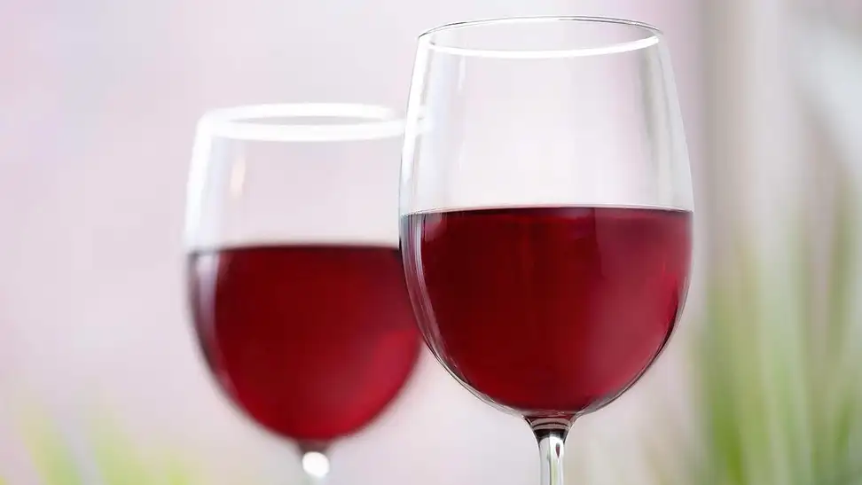 A set of wine glasses on a table.