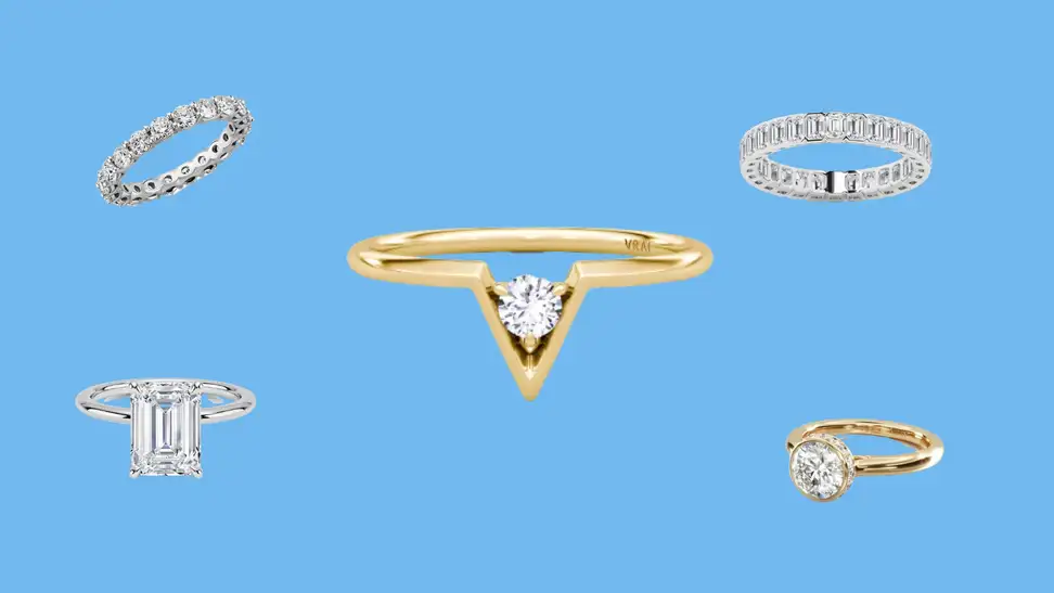 Five lab-grown diamond rings in front of a blue background.