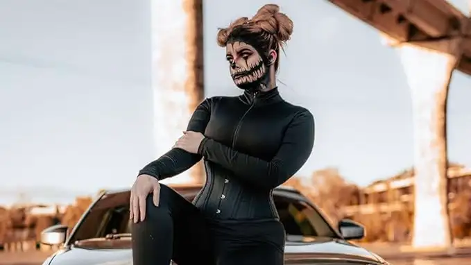 A woman wearing a catsuit as part of her Halloween costume.