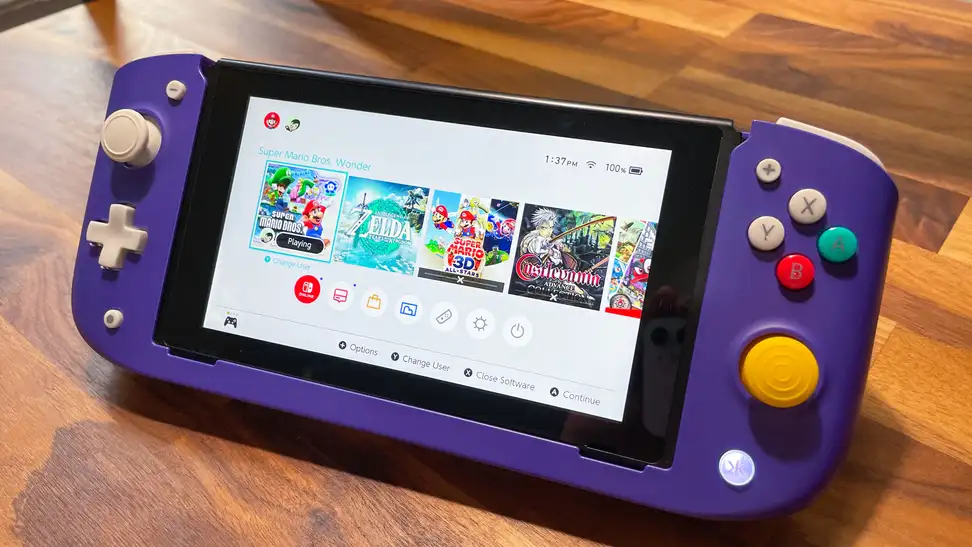 A purple CRKD Nitro Deck with a video game menu on the screen.