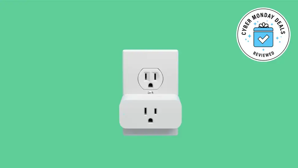 Amazon smart plug on a green background