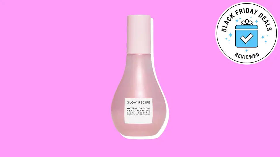 Photo of a pink bottle of Glow Recipe Watermelon Niacinamide Dew Drops against a pink background.