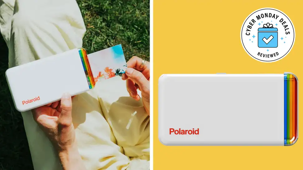 Someone holding a Polaroid Hi-Print portable printer next to the same model with a Cyber Monday Deals Reviewed badge in front of a colored background.