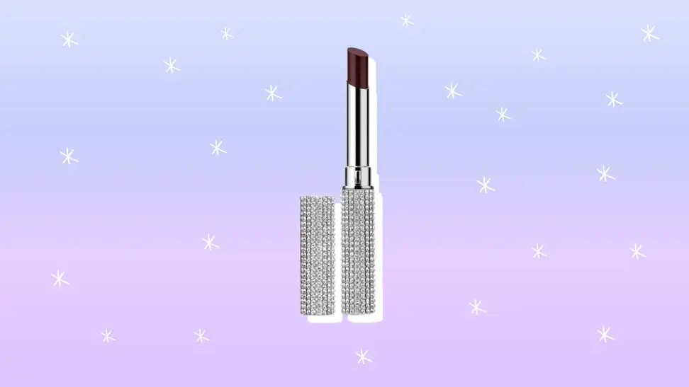 Clinique Black Honey lipstick against a blue and purple background.