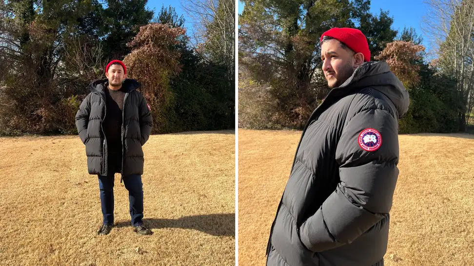 The author wearing a black puffer coat.