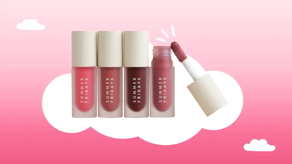 Four Summer Fridays lip oils against a pink background sitting on a cloud.