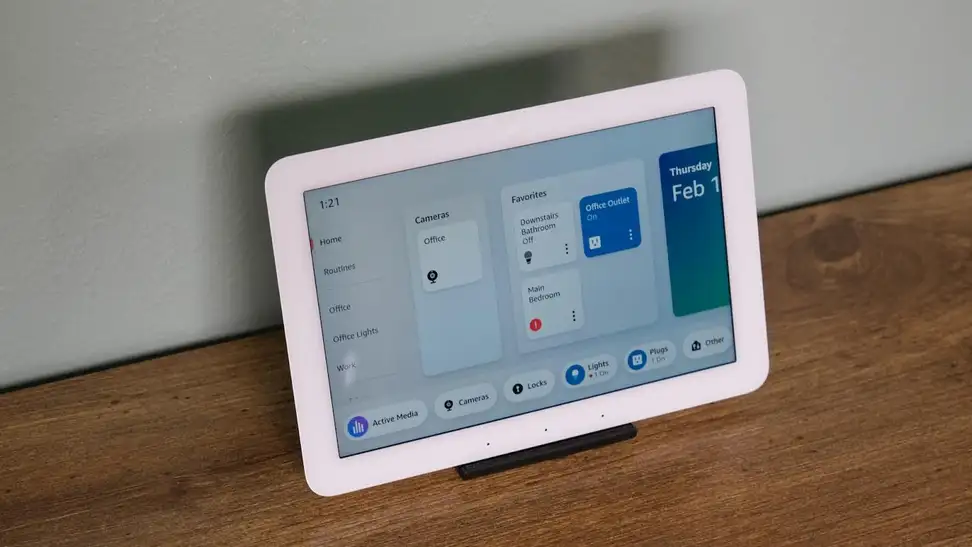 The Amazon Echo Hub with the screen sitting on a wood table.
